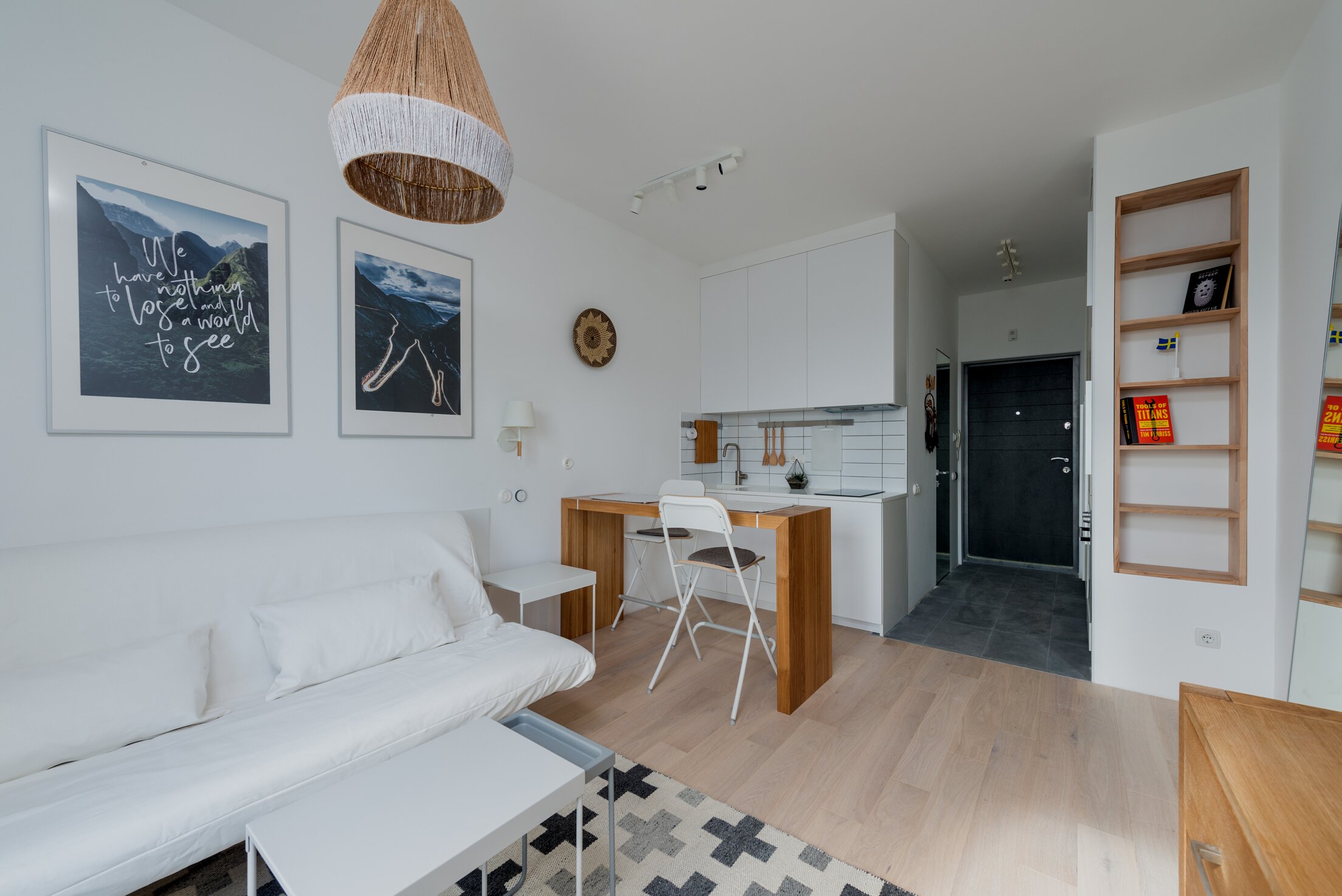 Light living room with small kitchen zone in contemporary flat